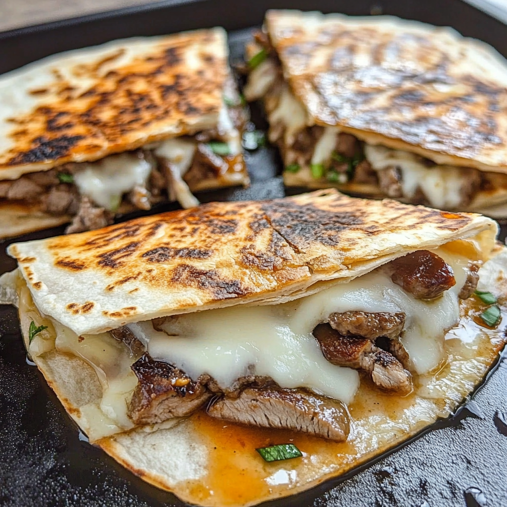 Recipe preparation for Steak Cheese Quesadillas on Blackstone